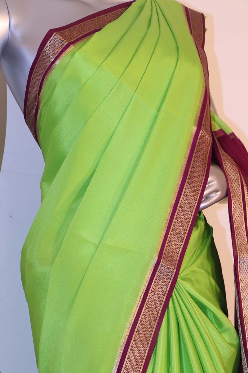 Mysore crepe silk saree in green with contrast pallu in red